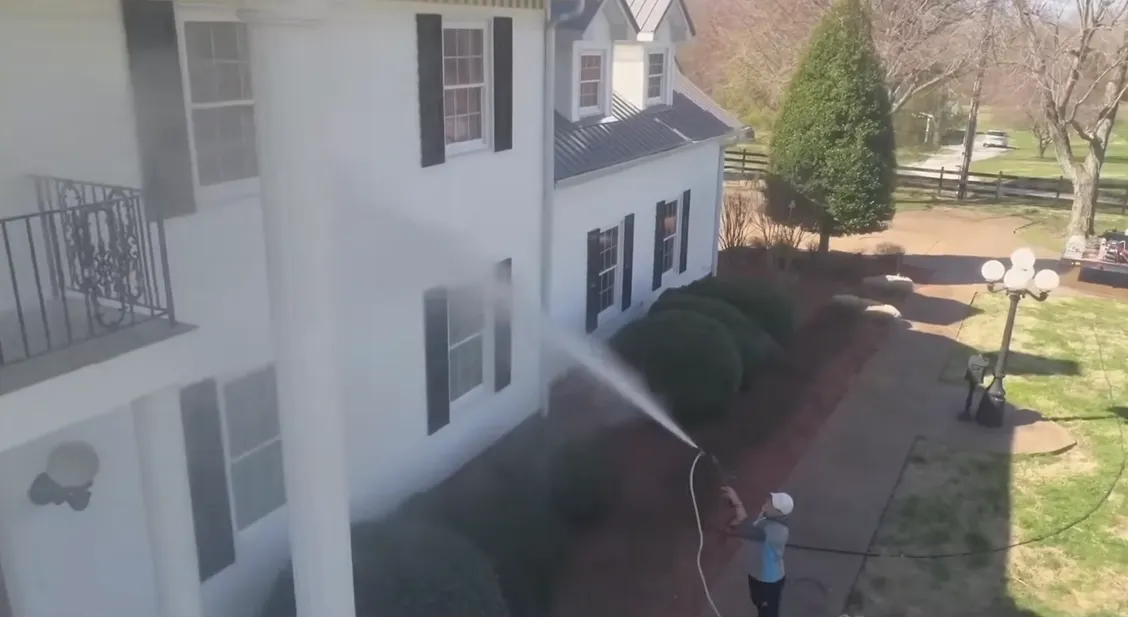 Professional house washing Jacksonville FL soft wash 2-story home exterior